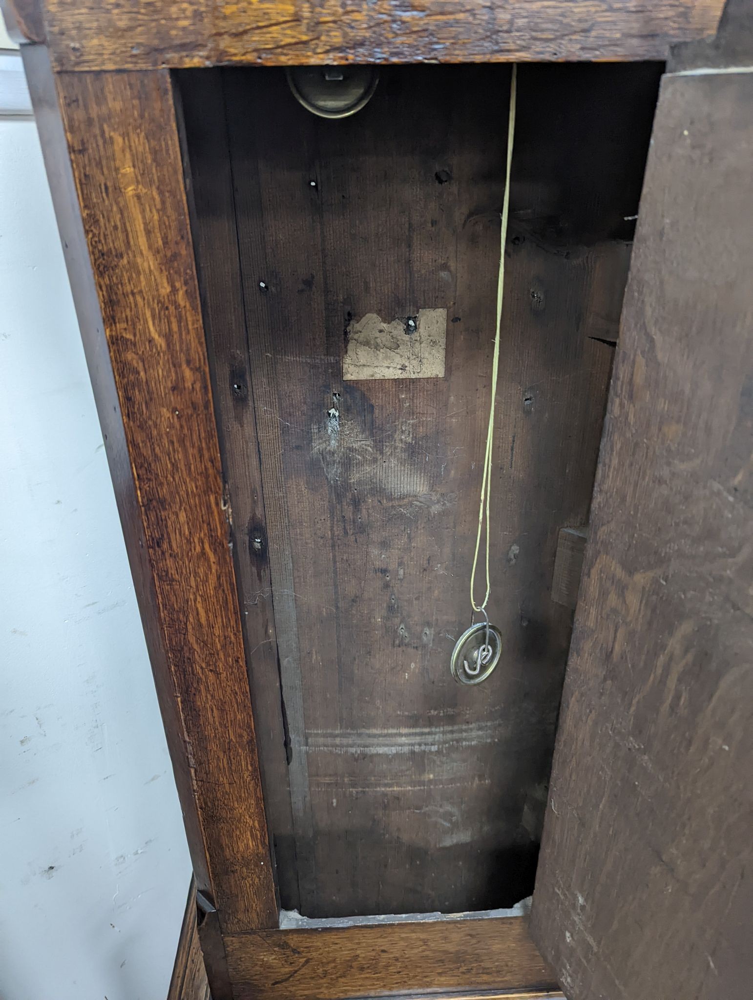 A George III 8 day oak cased longcase clock, height 217cm